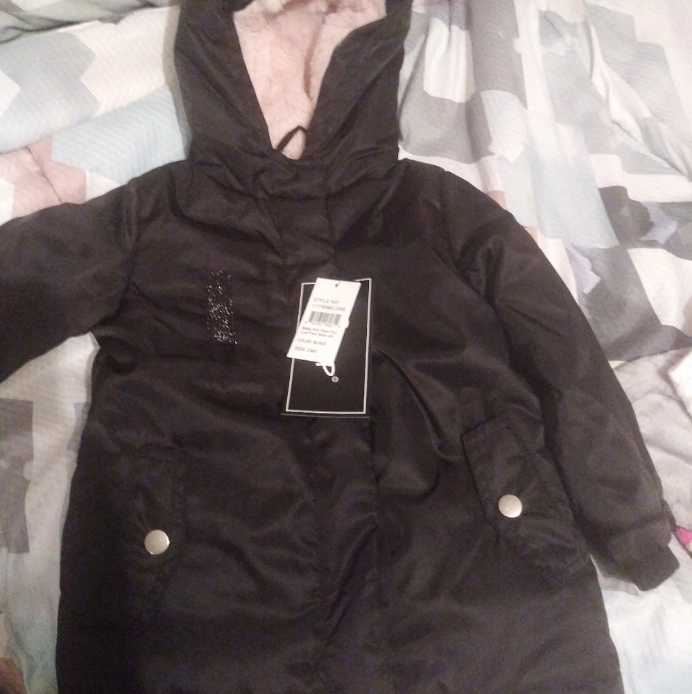 Black jacket with pink fur